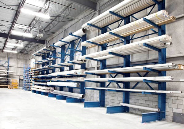 cantilever racking in warehouse holding pipes
