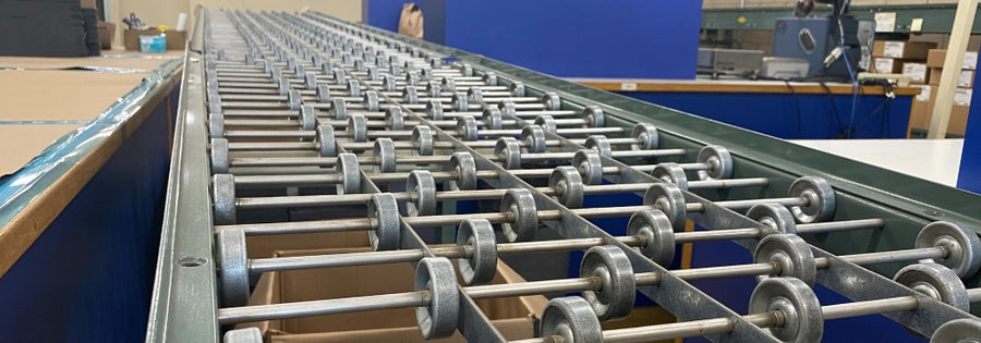 Lineshaft driven live roller conveyor for light cartons, totes, and packaged goods