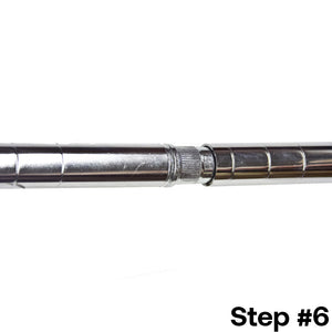 Final step of installing a post extension kit for 1-inch diameter wire shelving post, with the chrome kit securing the shelving posts into one continuous post.